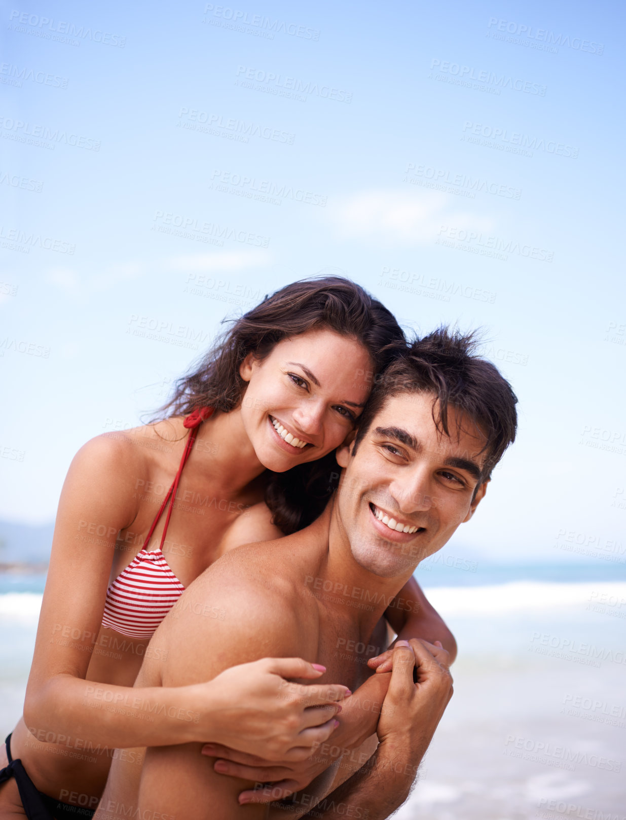 Buy stock photo Love, hug and portrait of couple at ocean for tropical holiday adventure, relax and bonding together. Nature, man and woman smile on romantic date with beach, blue sky and embrace on happy vacation.