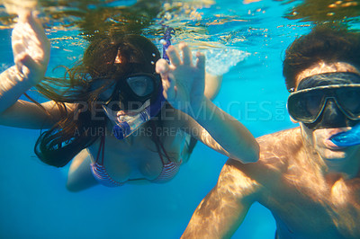 Buy stock photo Scuba diving, underwater or couple swimming to explore for marine adventure, hobby or vacation activity. Mask, divers or people at a beach or ocean for travel, tropical environment or outdoor holiday