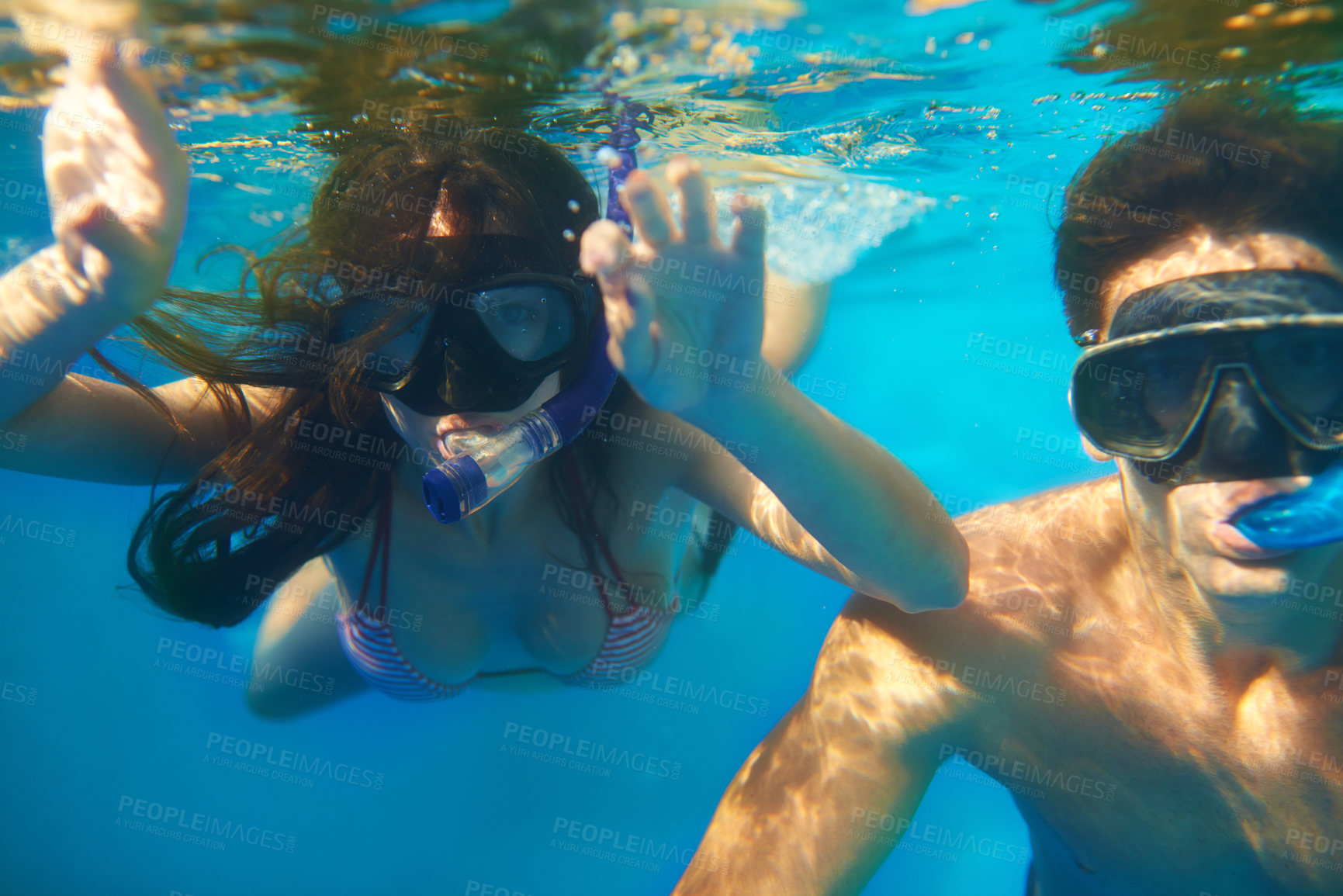 Buy stock photo Scuba diving, underwater or couple swimming to explore for marine adventure, hobby or vacation activity. Mask, divers or people at a beach or ocean for travel, tropical environment or outdoor holiday