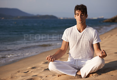 Buy stock photo Meditation, lotus and man on beach, mindfulness and zen with fresh air for calm and eyes closed outdoor. Ocean, seashore and travel with yoga for health, peace of mind and holistic healing for aura