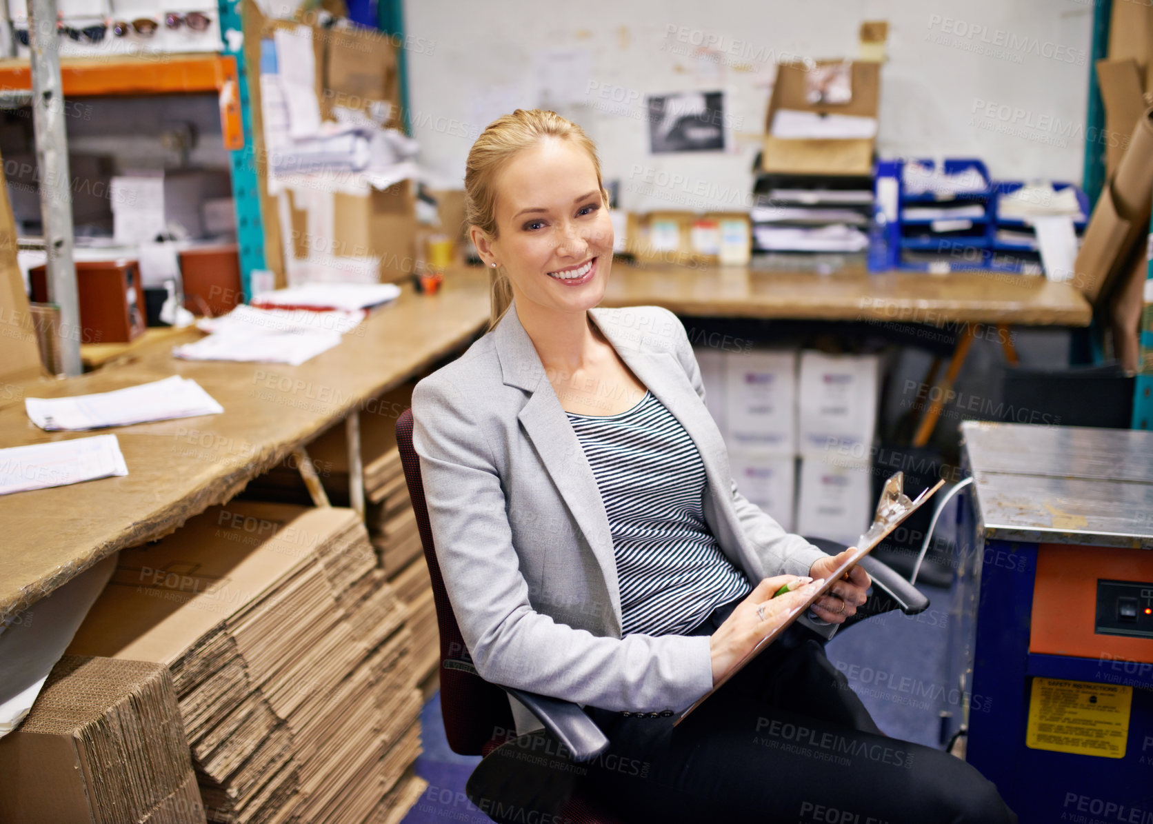 Buy stock photo Smile, face or business woman with clipboard in warehouse office for logistic, planning or cargo checklist. Industry, supply chain or factory manager with compliance documents for cardboard recycling