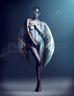 Buy stock photo Studio shot of a naked woman with wings and a mask