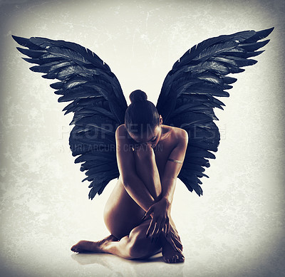 Buy stock photo Shot of of naked woman with wings spreading out behind her back