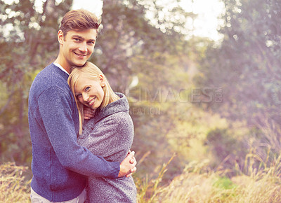 Buy stock photo Portrait, couple and hug with countryside space for love, romance or bonding in summer environment. Smile, safety or security with young man and woman embracing outdoor in nature for happy hiking