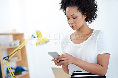 Buy stock photo Business woman, typing and phone in office for social media, chat and communication in human resources. African worker, employee or young person reading email or information on mobile for contact