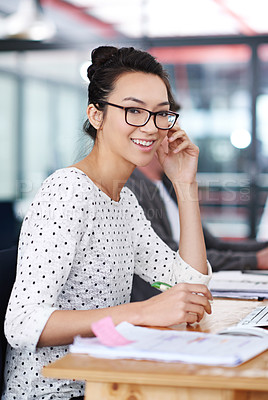 Buy stock photo Happy, portrait and creative woman at desk in office planning with notes for project or report. Professional, employee and person with a smile for productivity, process or work on development of idea