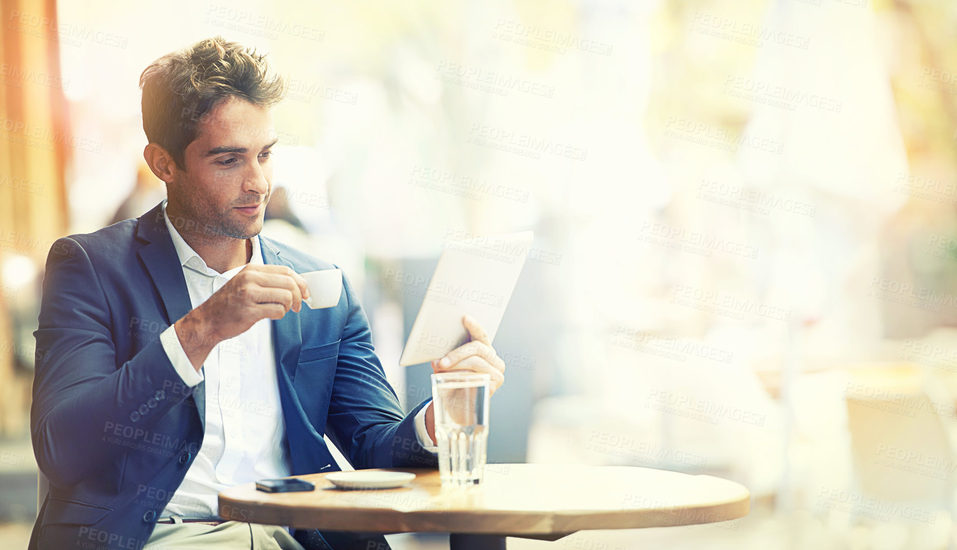 Buy stock photo Businessman, tablet and coffee outdoor at cafe with table for online news, internet and business. Entrepreneur, technology and water with phone for digital calendar, planning and reviews for company