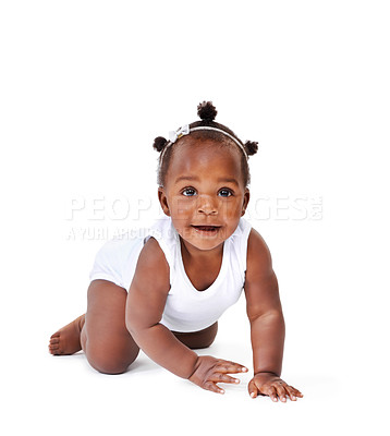 Buy stock photo Smile, crawling and African girl baby isolated on white background with playful happiness and growth. Learning to crawl, playing and sitting, face of happy black kid on studio backdrop with childcare