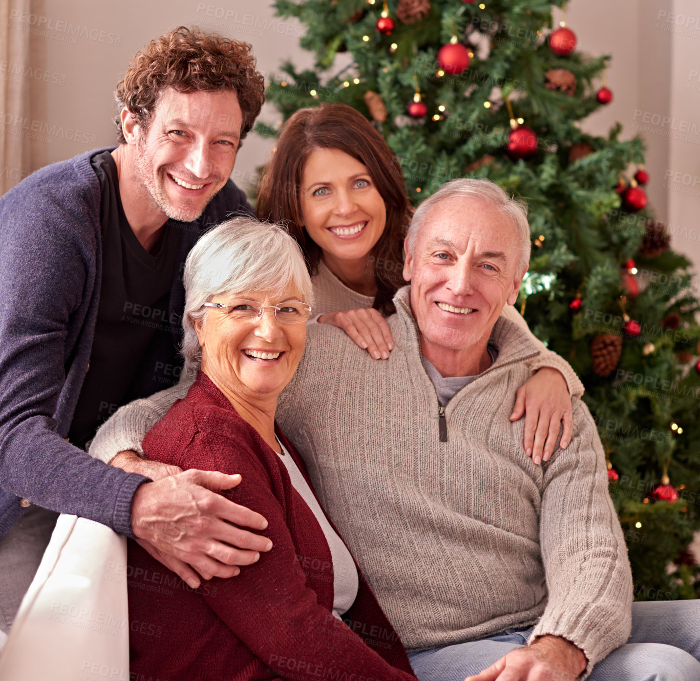 Buy stock photo Happy family, portrait and grandparents home for Christmas to celebrate together with daughter and son. Elderly parents, man and woman love spending quality time or bonding on sofa in winter holidays