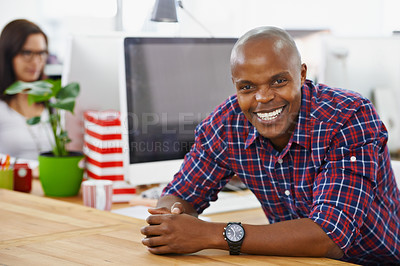 Buy stock photo African man, portrait and sitting with smile, technology and web designer in office workspace at desk. Businessman, confident and workplace for online company search, internet browse or proud person