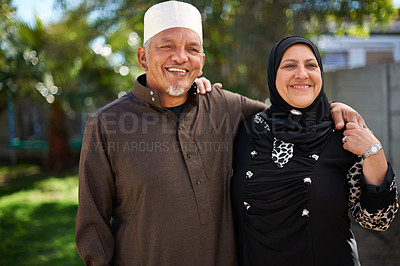 Buy stock photo Portrait of a smiling senior muslim couple outside
