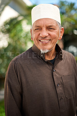 Buy stock photo Senior man, muslim and smile in outdoor for eid or ramadan holiday for religion to enjoy and satisfied. Faith, Islam and happy on break with hope in fasting on outfit for mosque and Islamic.