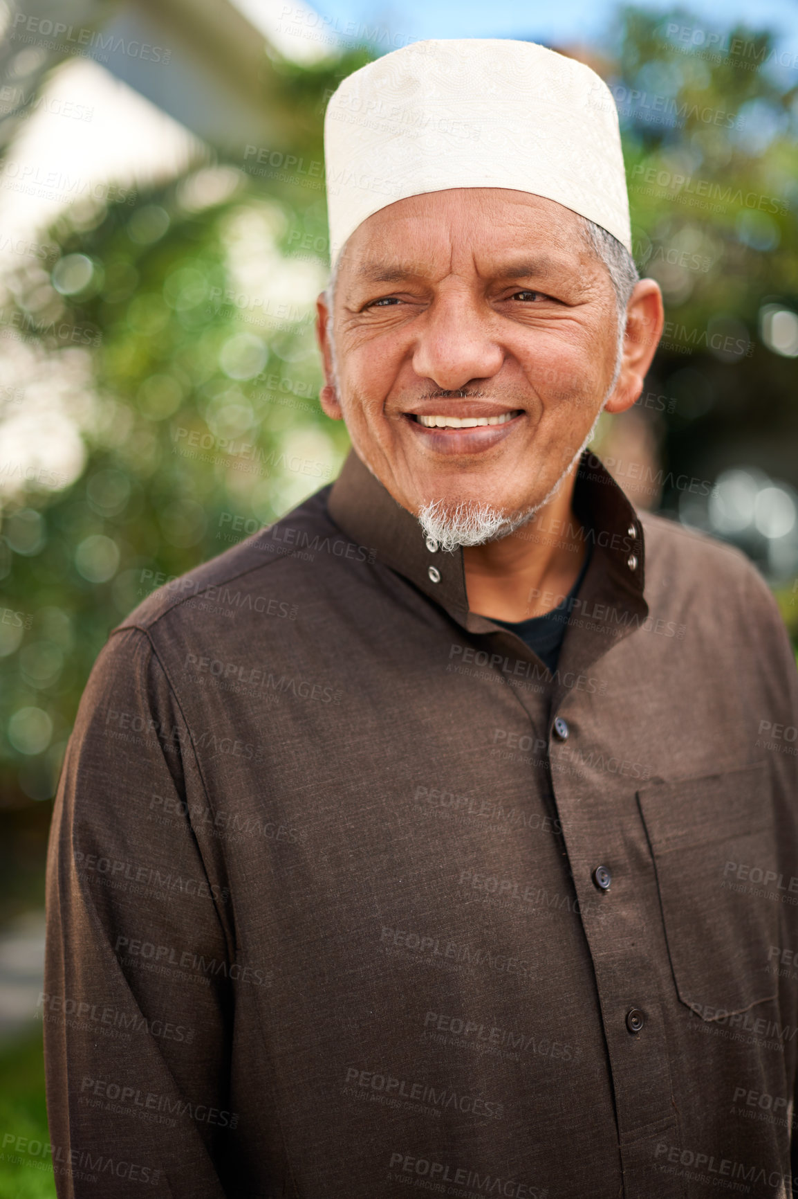 Buy stock photo Senior man, muslim and smile in outdoor for eid or ramadan holiday for religion to enjoy and satisfied. Faith, Islam and happy on break with hope in fasting on outfit for mosque and Islamic.
