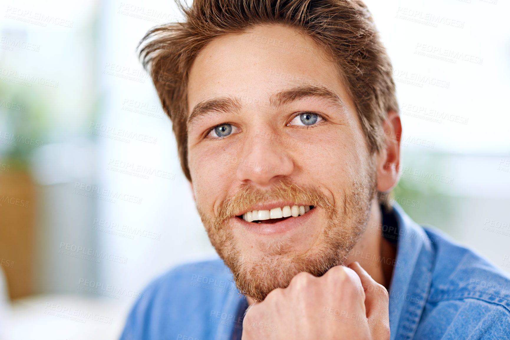 Buy stock photo Shot of a relaxed-looking young man 