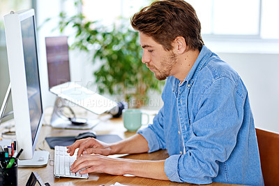 Buy stock photo Office, employee and man with keyboard, computer and technology for job, networking and internet. Creative, male person and staff for remote, working and happiness for career as author on desk