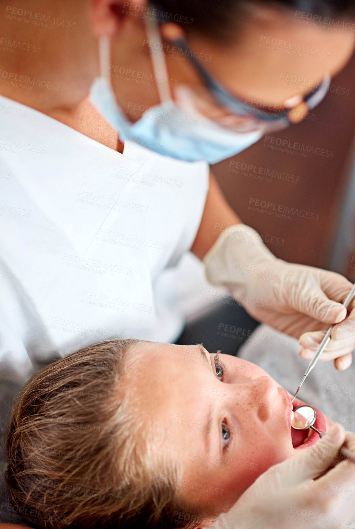 Buy stock photo Mirror, dentist and woman with child for exam, healthcare or orthodontics for teeth in clinic. Dental hygiene, kid and doctor with tools for patient, oral or cleaning mouth with medical pediatrician