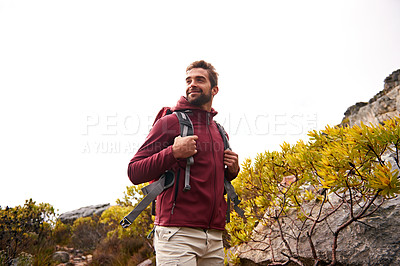Buy stock photo Happy, man and hiking with backpack on mountain for travel, adventure and fitness. Male person, smile and tourist, camping, exercise and trekking countryside or forest outdoors for sightseeing