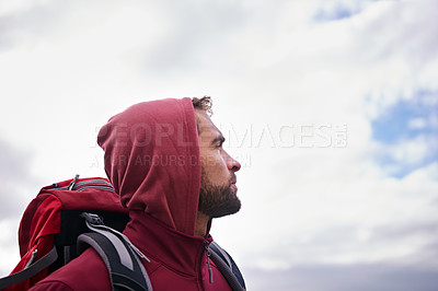Buy stock photo Sky, hiking and man with backpack, thinking and outdoor in nature for adventure, peace and travel. Contemplation, mindfulness and male person looking up, thoughtful and journey for holiday and break