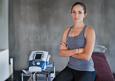 Buy stock photo Portrait, woman and physio in studio for health with massage table for fitness, rehab and confidence. Female person, chiropractor and machine in clinic for wellness with muscles and electrotherapy
