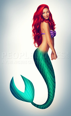 Buy stock photo Shot of a beautiful red-headed mermaid