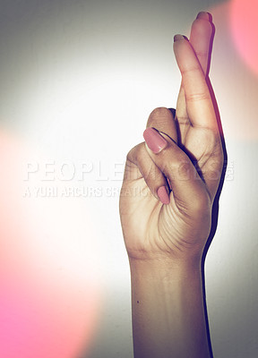 Buy stock photo Hand, fingers crossed and hope for prayer in studio for promotion isolated on a white background mockup space. Palm, wish and closeup of gesture for good luck, winning or communication sign of woman