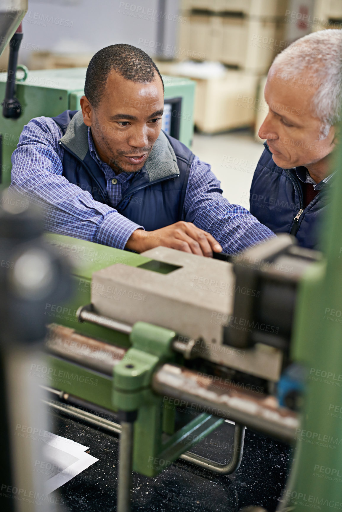 Buy stock photo Factory, machine and coworkers in work talking, maintenance for industrial safety and diversity employees together. Mechanical engineering, production monitoring system or inspection in warehouse