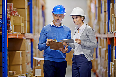 Buy stock photo Warehouse, man and woman with tablet, distribution and inspecting inventory with cooperation. Supply chain, supervisor and management with technology and update schedule with import and industrial
