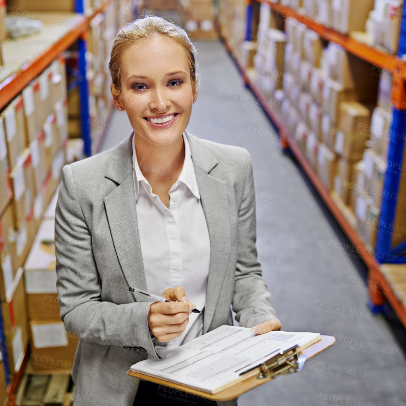 Buy stock photo Portrait of a woman at work in a storage warehouse