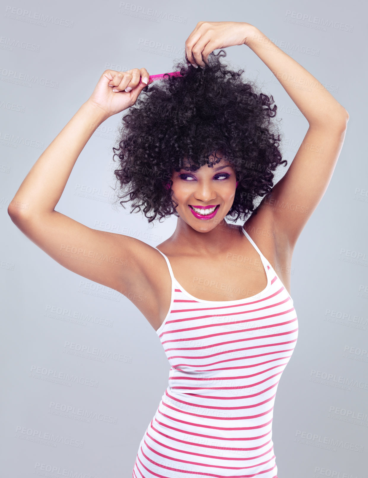 Buy stock photo Black woman, smile and afro in studio alone for haircare with comb, elegant and stylish. Girl, happy and confident with natural curl texture for cosmetics, beauty and fashion grey background