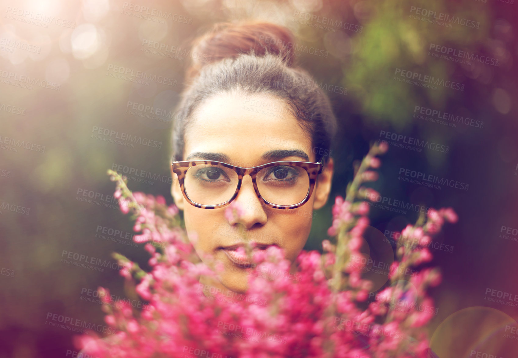 Buy stock photo Face, woman and flowers in garden for Spring, nature and fresh air with calm or peace in environment. Plant, foliage and natural in backyard, blossom or bloom with wildflowers outdoor in portrait