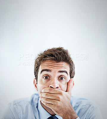 Buy stock photo Portrait, business and hands over mouth with man, censored and employee on grey studio background. Face, person or consultant with mockup space and secret with privacy or shocked with confidentiality