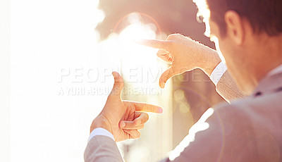 Buy stock photo Business man, finger frame and city with vision for insight, outdoor and perspective with lens flare. Male person, suit and view with foresight for planning, future and angle for strategy with idea