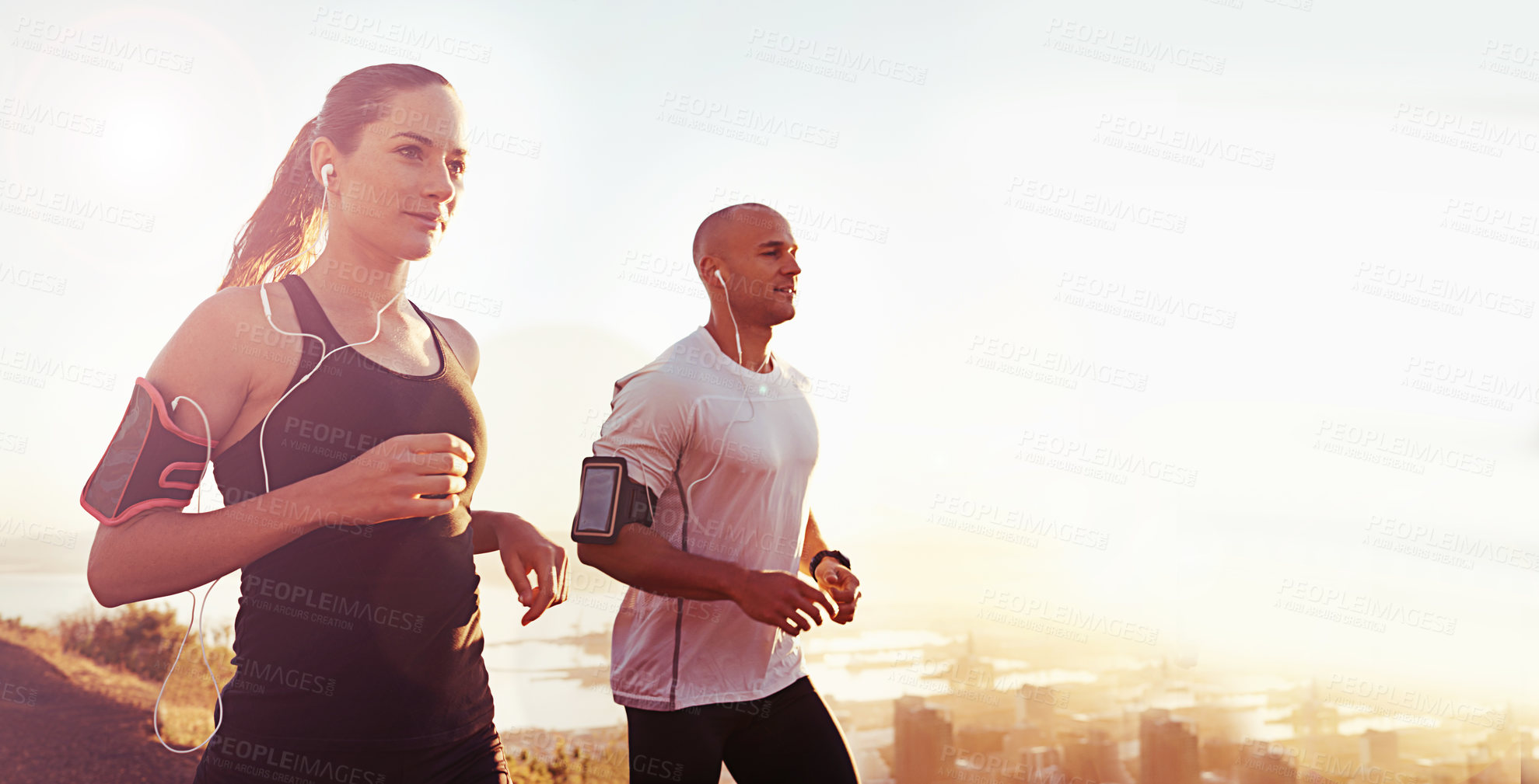Buy stock photo Fitness, nature and friends running at sunset with radio, energy or freedom on morning, marathon or practice. Sports, training and people outdoor for sunrise, run or cardio workout while streaming