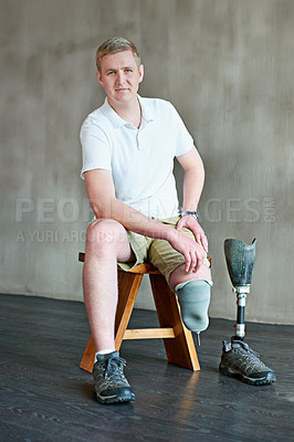 Buy stock photo Man, portrait and amputee with prosthetic leg, sitting and residual limb or assemble. Gym workout, physiotherapy and fitness for wellness or male person with a disability, exercise and rehabilitation