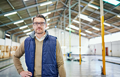 Buy stock photo Portrait of a man working in a distribution warehouse