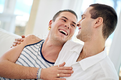 Buy stock photo Men, gay and happy couple in home relax with bonding connection or queer pride for homosexual, love or comfort. Male people, embrace and laughing joke in apartment for relationship, marriage or rest