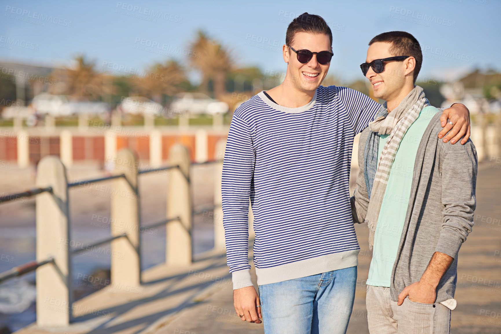 Buy stock photo Happy, love and queer male couple on walk, promenade and outside for exercise on holiday. LGBT, marriage and affection with hug for smile and gay partnership, relationship and vacation or honeymoon