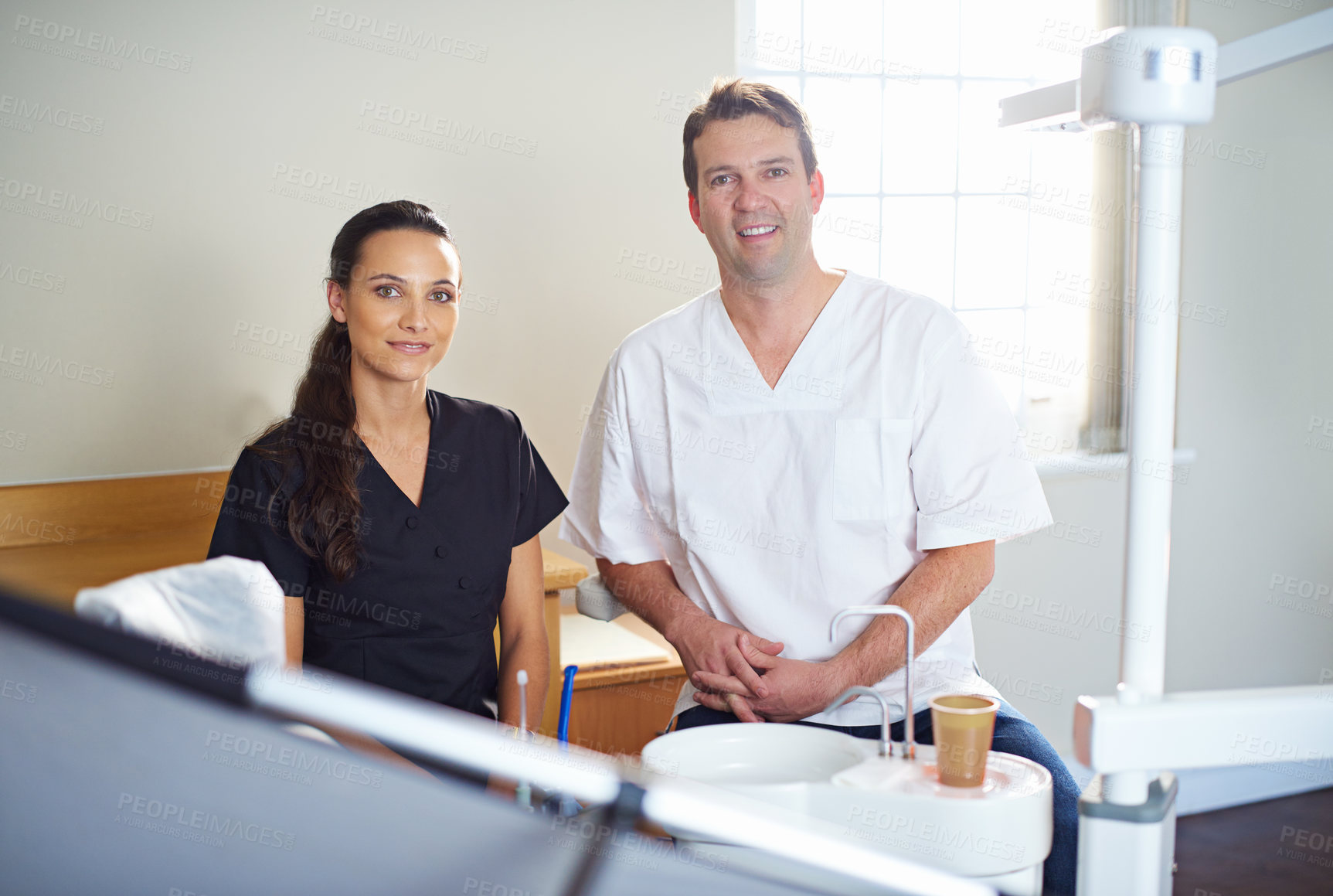 Buy stock photo Portrait, smile or dentist team in consulting office for help, advice or mouth wellness exam. Dental, oral care or doctor and orthodontist intern with friendly service, teeth whitening or hygiene