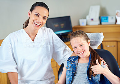 Buy stock photo Thumbs up, clinic and portrait of dentist with child for cleaning, teeth whitening and wellness. Healthcare, dentistry and happy woman and girl for dental hygiene, oral care and medical services