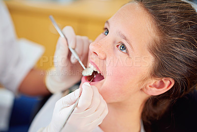 Buy stock photo Shot of a female dentist and child in a dentist office