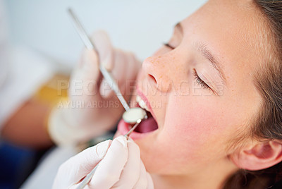 Buy stock photo Girl, kid and mouth inspection at dentist with healthcare tool, consultation and dental equipment for oral health. Expert, child patient and glove hand for teeth cleaning, gingivitis and medical care