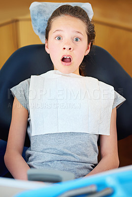 Buy stock photo Scared, fear or portrait of child at dentist with phobia, panic or overwhelmed by dental exam. Orthodontics, stress or face of kid nervous for teeth, cavity or bacteria, risk or gum disease emergency
