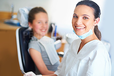 Buy stock photo Portrait of a female dentist and child in a dentist office