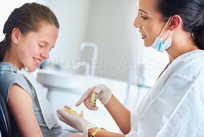 Buy stock photo Child, checkup and dentist office for smile, teeth whitening or oral healthcare for cleaning with patient. Woman, girl or kid and happy for tooth, mouth and consultation for cavity or gingivitis
