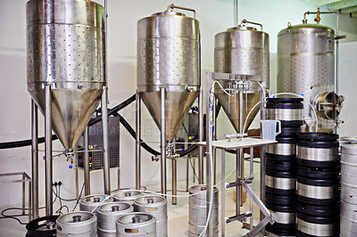 Buy stock photo Shot of steel tanks in a brewery