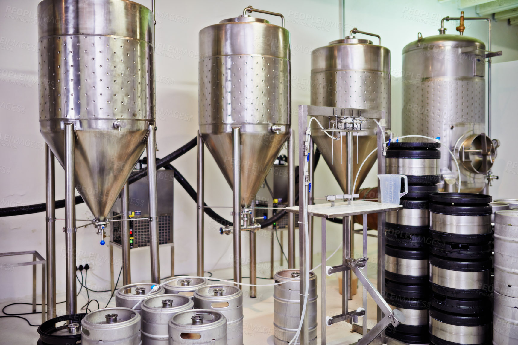 Buy stock photo Shot of steel tanks in a brewery