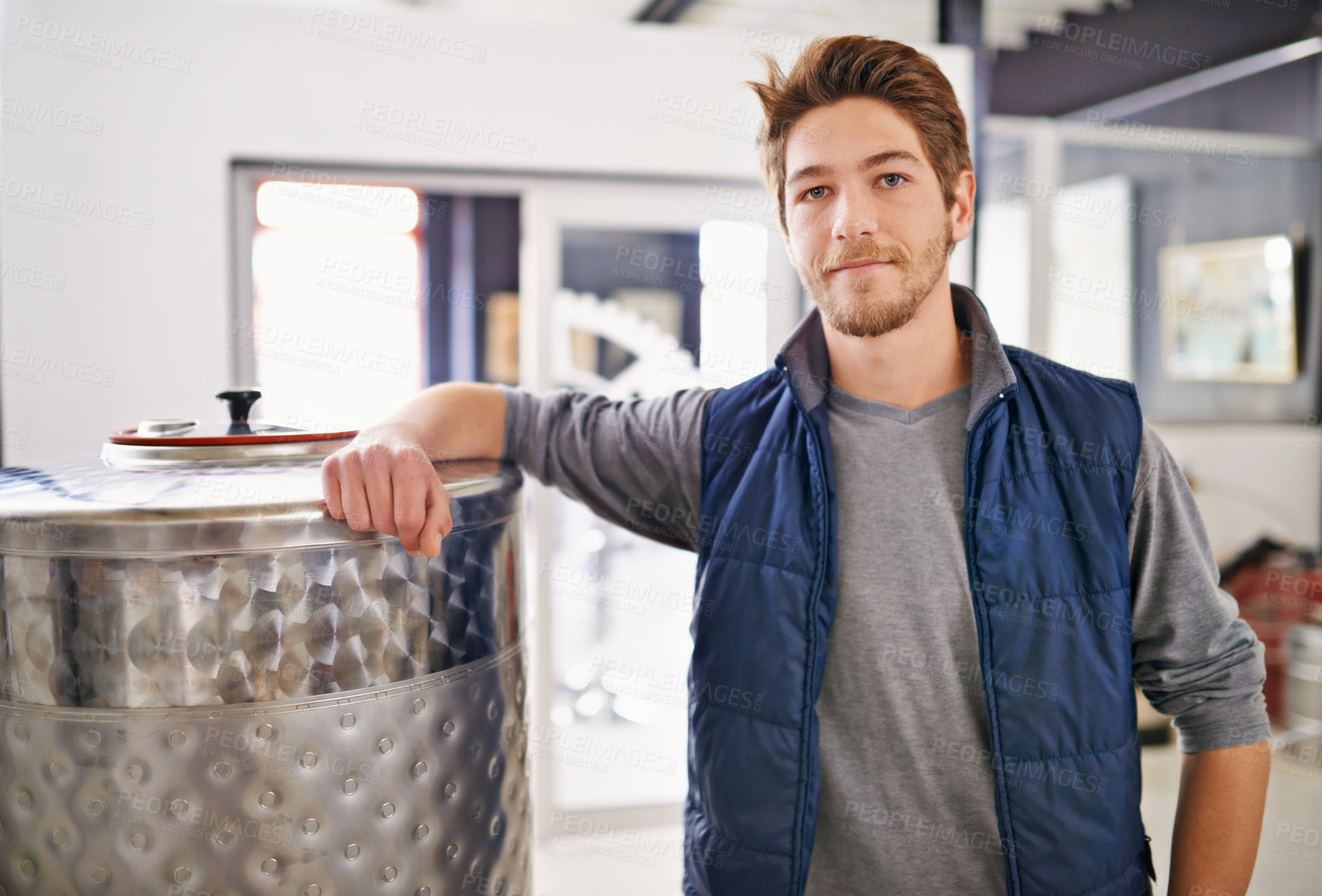 Buy stock photo Brewery, man and portrait with tank in factory with confidence, pride and container machine for manufacturing. Industrial, worker and smile with beer production for alcohol brewing in warehouse