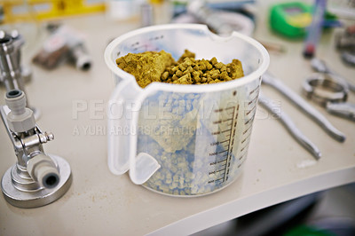 Buy stock photo Beer manufacturing, hops or barley and cup for process, factory or brewery with tools for drink. Measuring natural ingredients, organic and with alcohol production in lab or distillery in industry