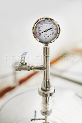 Buy stock photo Beer, production and temperature with steel in factory for winery, alcohol and drink manufacturing or distillery. Thermometer, container and fermentation vessel in closeup for brewery and industry