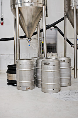 Buy stock photo Steel tank, keg and beer production at brewery with equipment for process, factory and storage with craft drink. Alcohol, metal container and industrial machine, brewing system and manufacturing